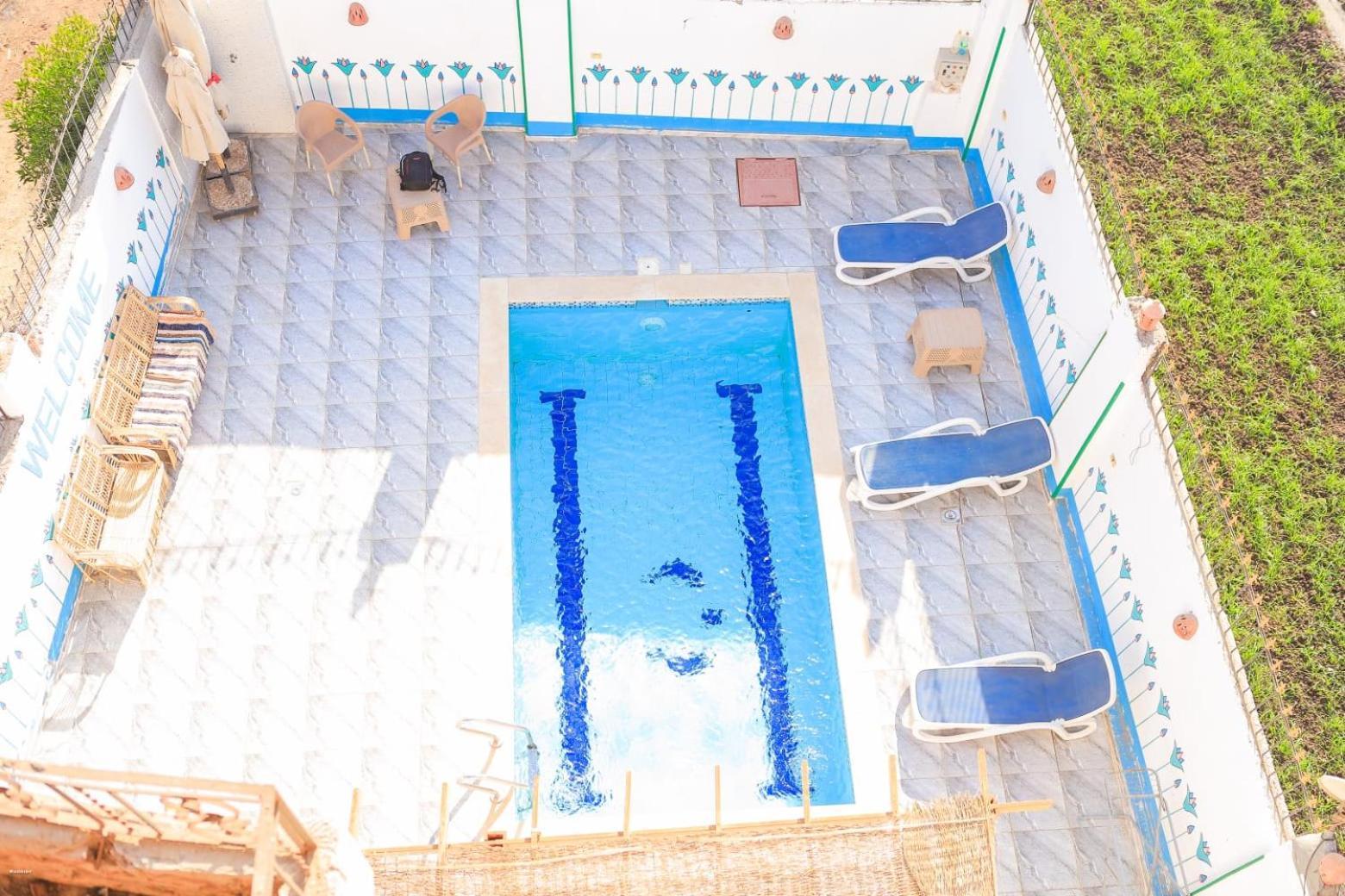 Quiet Gate Guest House Al Aqalitah Bagian luar foto