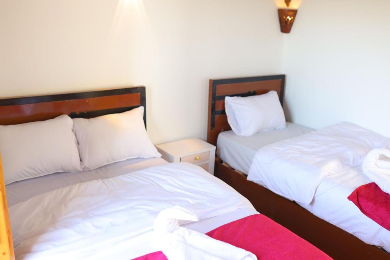 Quiet Gate Guest House Al Aqalitah Bagian luar foto