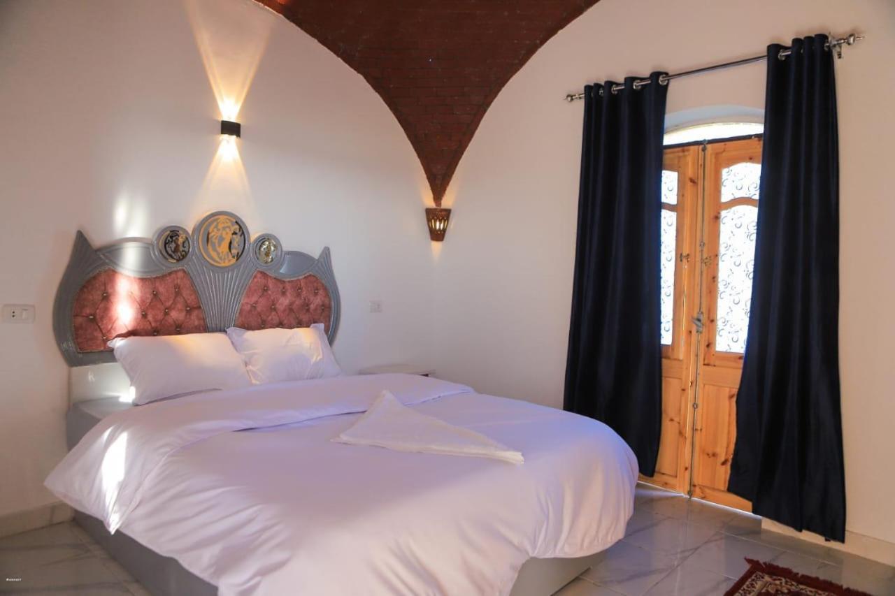 Quiet Gate Guest House Al Aqalitah Bagian luar foto